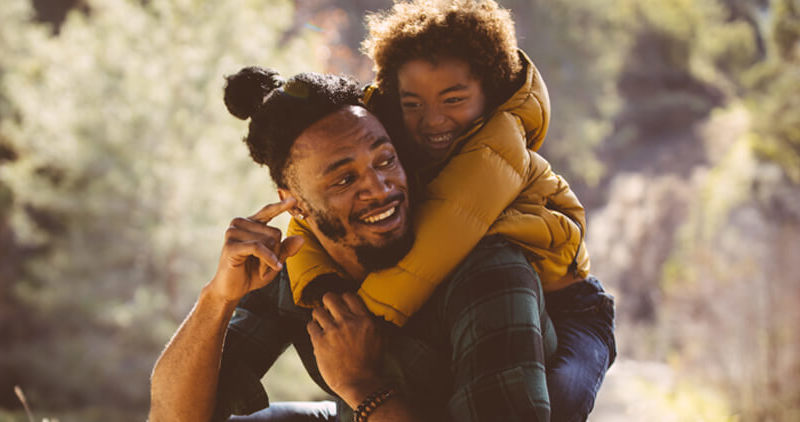 Father and child learning in the woodlands